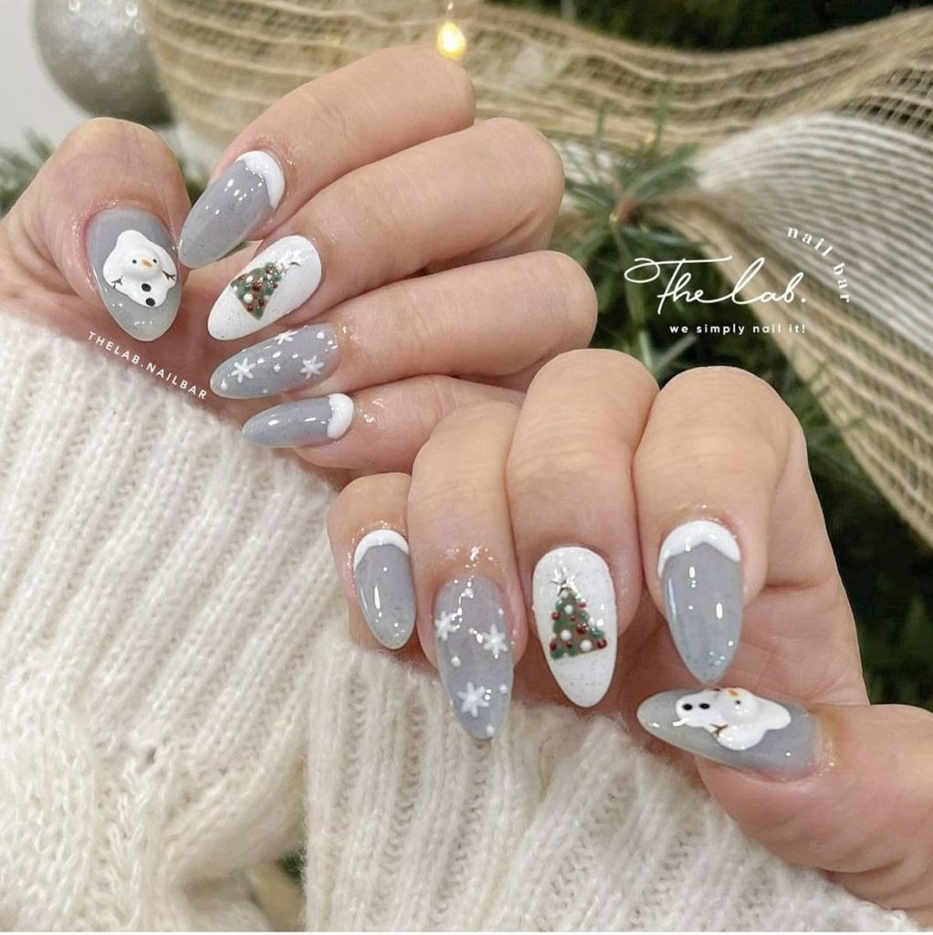 Mẫu nails bông tuyết kết hợp xanh pastel rất nịnh mắt. Ảnh: internet.